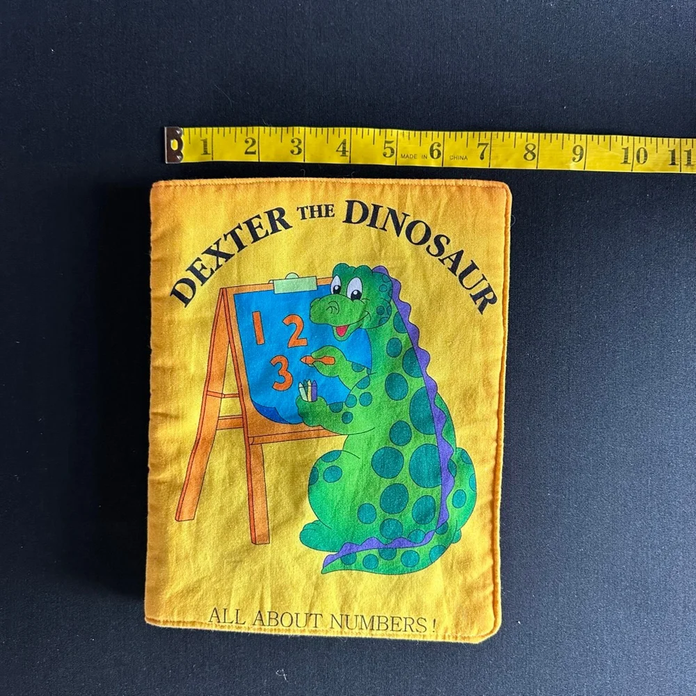 Dexter the Dinosaur Learning Toy Yellow Green cloth book
